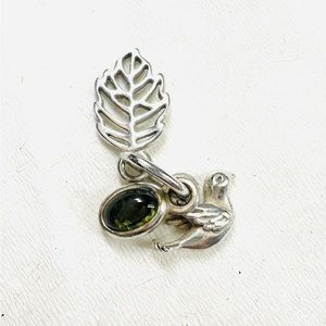 Authentic Pandora Dove charm with Peridot stone.